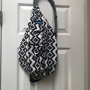 Gently used black and white  Kavu rope sling bag.